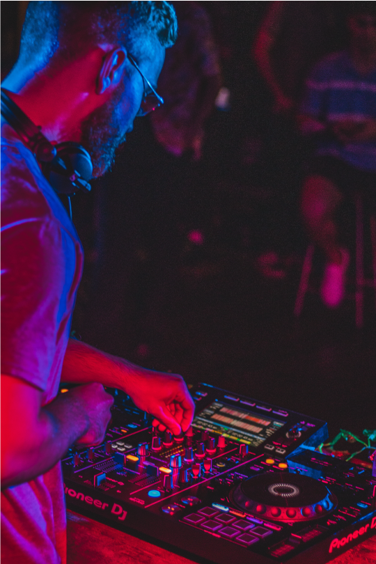 dj performing at a nightclub